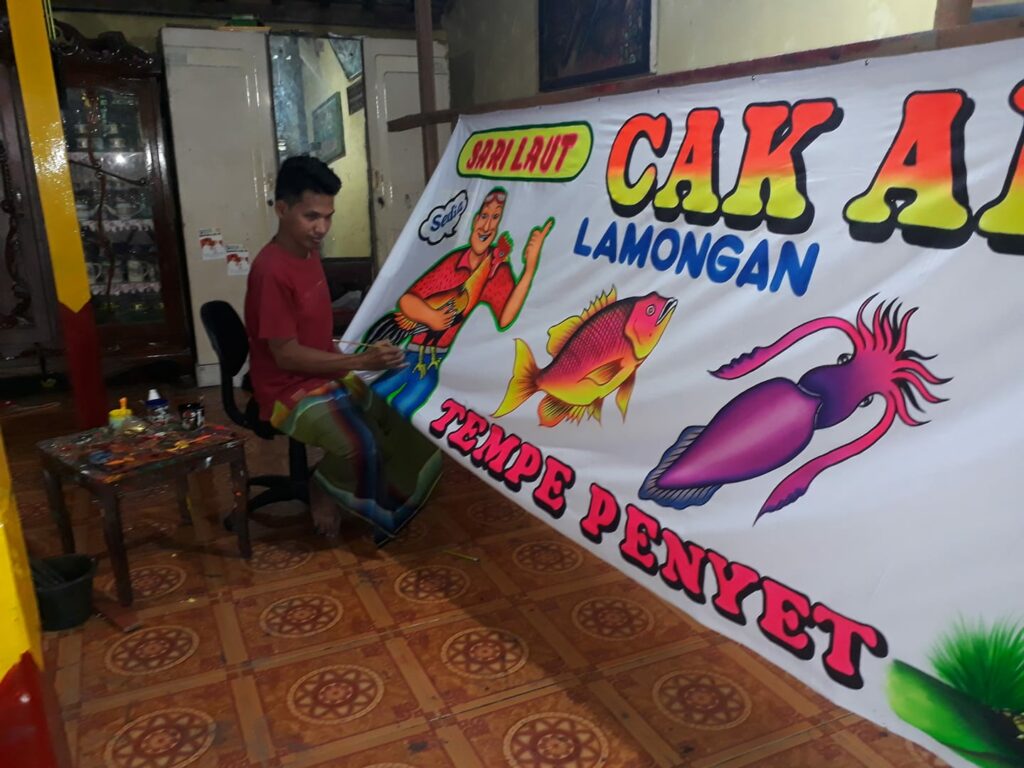pelukis spanduk pecel lele mojok.co
