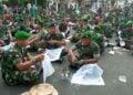 Ketika Tangan Seribu Tentara Membatik di Tugu Yogyakarta MOJOK.CO
