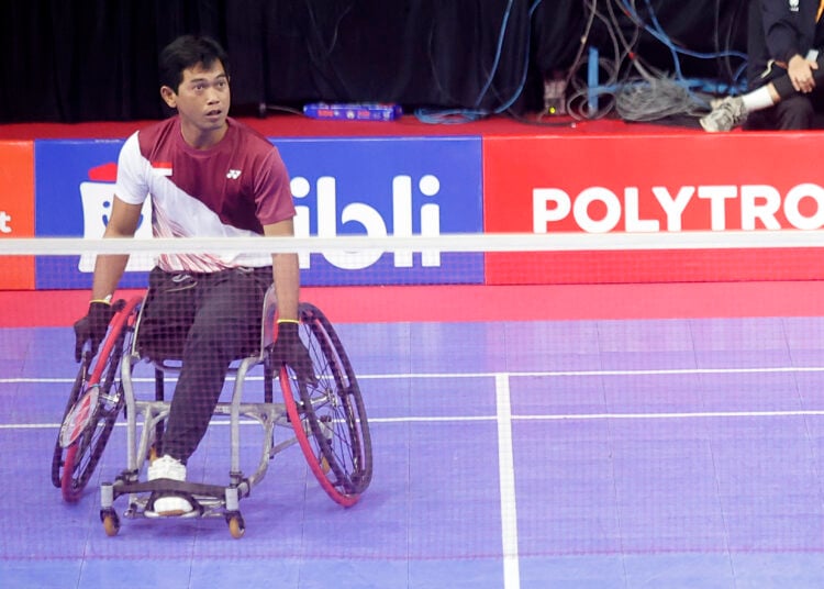 Supriadi, atlet bulu tangkos kursi roda di Polytron Indonesia Para Badminton 2025 Solo MOJOK.CO
