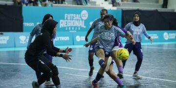 Nanda, kiper tim futsal putri UGM dalam Campus League 2025. MOJOK.CO