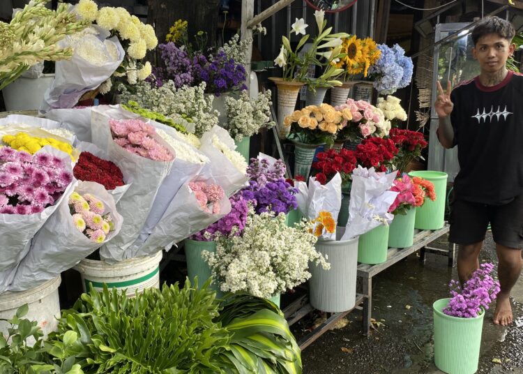 Pedagang bunga. MOJOK.CO