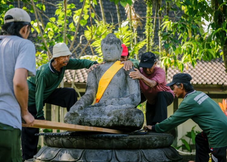 Arca Unfinished Buddha dipindahkan. MOJOK.CO
