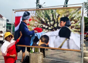 Pameran foto dalam Pesta Rakyat Jogja guna memeriahkan acara HUT ke-81 RI. MOJOK.CO